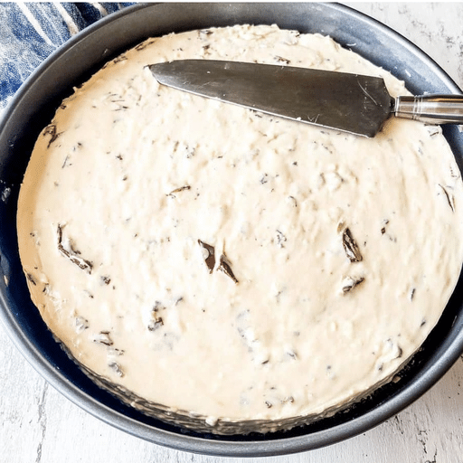 u6798196942_httpss.mj.runc0_fvhA0vJU_Reese_Cup_Ice_Cream_Cake_7f614b6d-99e7-44ec-b1ee-e040d40d3624_1 Pressing cookie crust for Reese Cup Ice Cream Cake